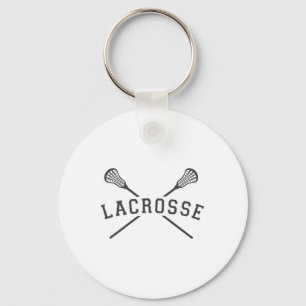 Llavero El equipo de Lacrosse masculino cruza las varas de