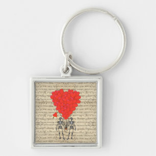 Llavero El extraño esqueleto vintage y el corazón rojo