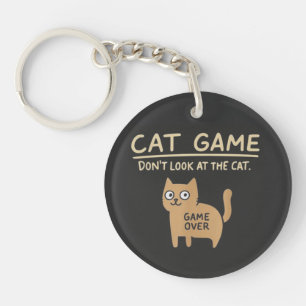 Llavero el juego del gato no mira el juego del gato