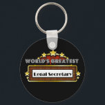 Llavero El mayor secretario legal del mundo<br><div class="desc">Los mejores Camisetas, ropa y regalos de la Secretaría de Asuntos Jurídicos del mundo son regalos ideales para el reconocimiento de empleos de los empleados, además de regalos para todas las ocasiones. Este singular diseño de marquesina muestra la ocupación y la profesión rodeadas de luces de neón y estrellas. Disponible...</div>