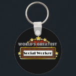 Llavero El mayor trabajador social del mundo<br><div class="desc">Los mayores Camisetas, ropa y regalos de los trabajadores sociales del mundo son la ocupación ideal y los regalos de reconocimiento a los empleados además de regalos para todas las ocasiones. Este singular diseño de marquesina muestra la ocupación y la profesión rodeadas de luces de neón y estrellas. Disponible en...</div>