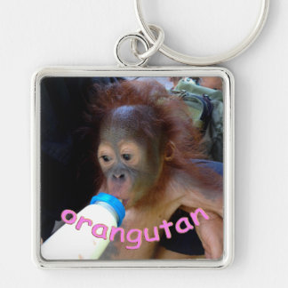 Llavero El orangután del bebé bebe la botella