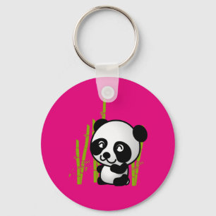 Llavero El oso blanco y negro de panda en un bosque de bam