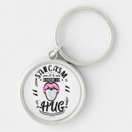 Llavero El sarcasmo es como abraza la cita