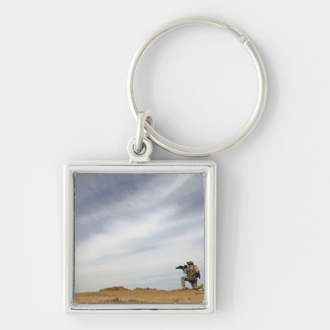 Llavero El sargento proporciona seguridad (Frente)