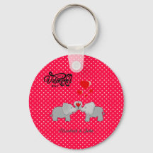 Elefantes románticos y corazones rojos en puntos d