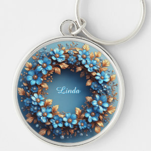 Llavero Elegante Corona Floral de Elementos Azules y Dorad