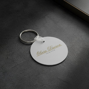 Llavero Elegante guión dorado minimalista