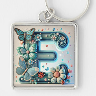Llavero Elegante letra floral E con mariposas