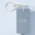 Llavero Elegante Monograma moderno Minimalista azul turbio<br><div class="desc">Presentamos nuestra Dusty Blue Minimalista Monogram Elegant Collection: Eleva tu estilo con sofisticación y encanto intemporal. Nuestra colección presenta diseños minimalistas en un suave y polvoriento matiz azul, realzados con elegantes monogramas adaptados a su gusto personal. Desde la papelería refinada hasta los accesorios versátiles, cada pieza de nuestra colección está...</div>