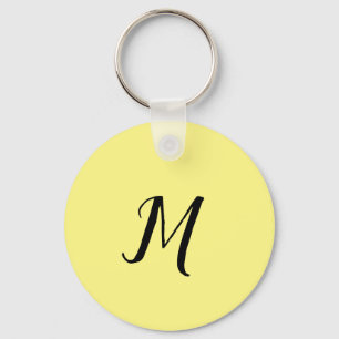 LLAVERO ELEGANTEMONOGRAMA AMARILLO MINIMALISTA SIM