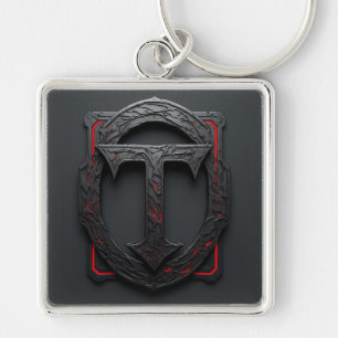 Llavero 🛡️ Emblema de escudo T de metal gótico con acento