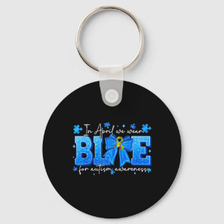Llavero en abril usa azul para la conciencia del autismo m