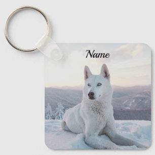 Llavero Encantando Perro Husky Blanco en la nieve