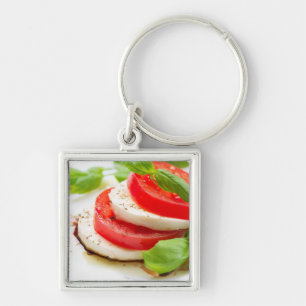 Llavero Ensalada de Caprese. Rebanadas del tomate y de la
