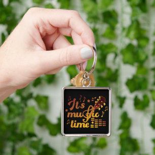 Llavero Es momento de la música, guitarra de oro musical