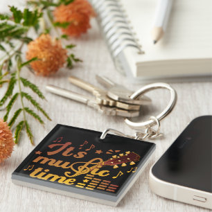 Llavero Es momento de la música, guitarra de oro musical