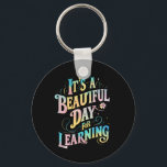 Llavero Es un bello día para aprender de vuelta a la escue<br><div class="desc">Es un bello día para aprender de vuelta a la escuela</div>