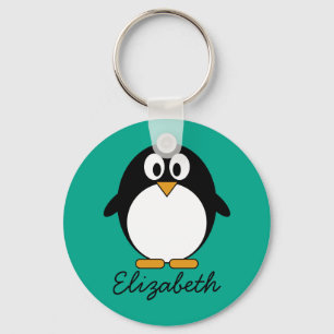 Llavero esmeralda linda y negro del pingüino del dibujo