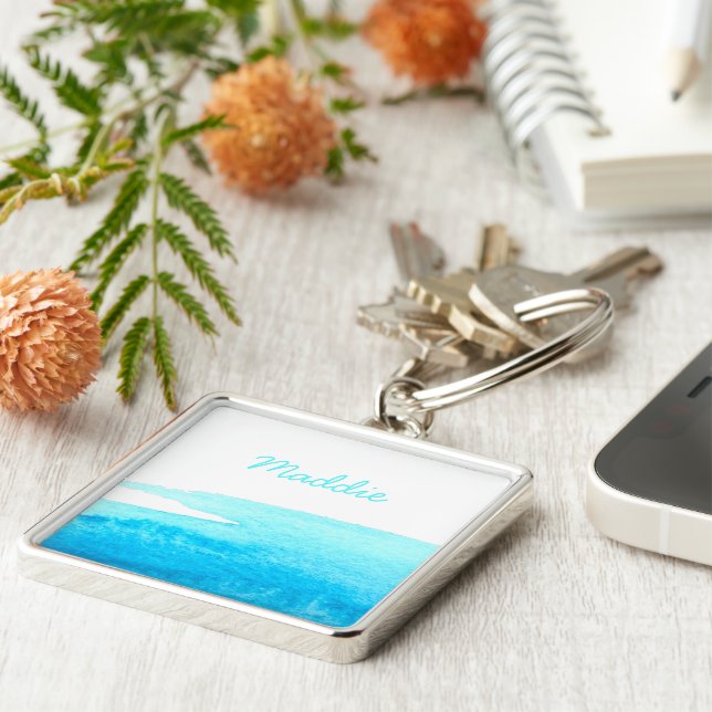 Llavero Espectáculo acuático azul cielo (Lado)