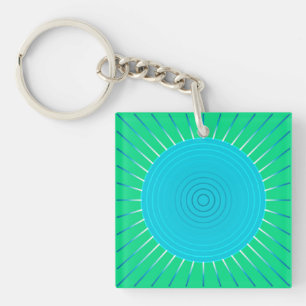 Llavero Estallido solar geométrico moderno - azul y verde