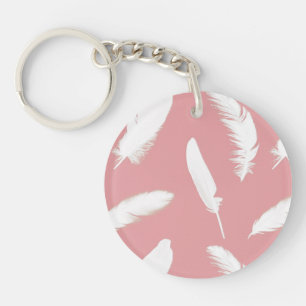 Llavero Estampa de pluma blanca sobre rosa caparazón