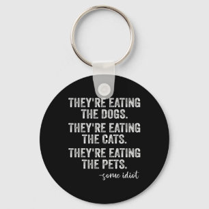 Llavero Están comiendo a los perros, los gatos, los Mascot