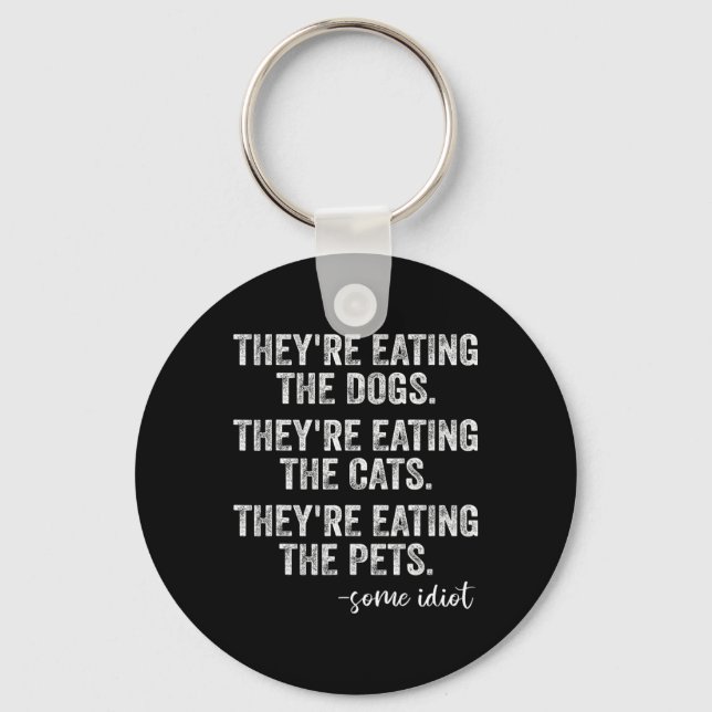 Llavero Están comiendo a los perros, los gatos, los Mascot (Anverso)