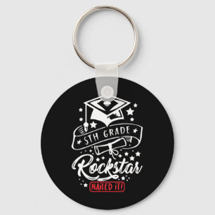 Llavero Estrella de rock estudiantil de quinto grado se bu