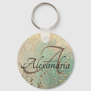 Llavero Estrellas de oro monograma sobre verde marino