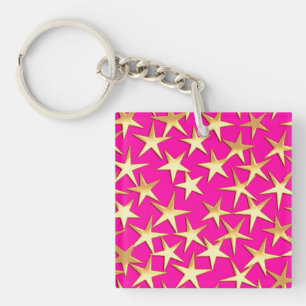 Llavero Estrellas doradas sobre rosa fucsia