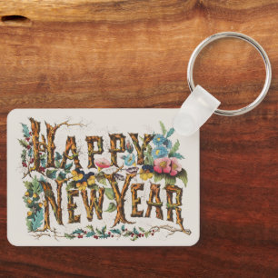 Llavero Feliz Año Nuevo en troncos de árboles, bellotas y 