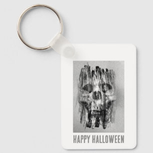 Llavero Feliz Halloween. Cráneo angustiado