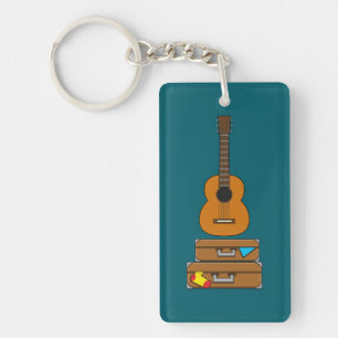Llavero Feliz viaje con equipaje y guitarra