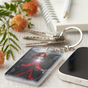 Llavero Femenino rezando en el cementerio