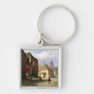 Llavero Figure antes de una iglesia de ladrillo en una