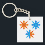 Llavero Fire and Ice Eight Point Stars<br><div class="desc">Keep your keys organized with this eye catching fire and ice eight point star keychain. The miniature version of this vibrant symmetrical graphic showcases the intense contrast between orange and blue elemental tones. This modern geometric accessory is a great way to add a pop of color and personality to your...</div>