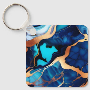 Llavero Flamante dorado azul trenzado