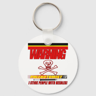 LLAVERO FLEBOTOMISTA DE ADVERTENCIA - ATACO A PERSONAS CON