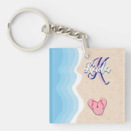 Llavero Flip-flops rosa en la playa