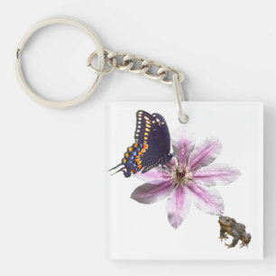 Llavero Flor de clematis y mariposa de cerda negra