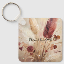 Llavero Flor de plumas de crema roja