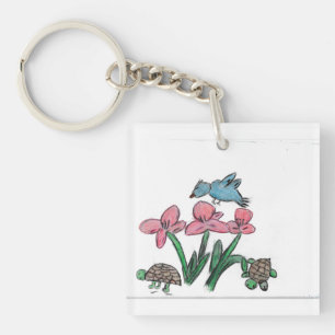 Llavero Flor rosa con pájaro