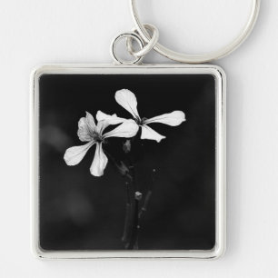 Llavero floral en blanco y negro minimalista