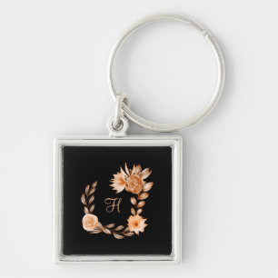Llavero Floral negro, marrón y melocotón monogramado