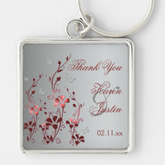 Llavero Floral roja y plateada con cadena de mariposas