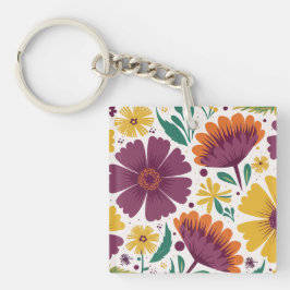 Llavero Floral vibrante con flores moradas y amarillas