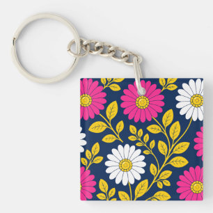 Llavero Floral Vibrante con Margaritas y Hojas Doradas