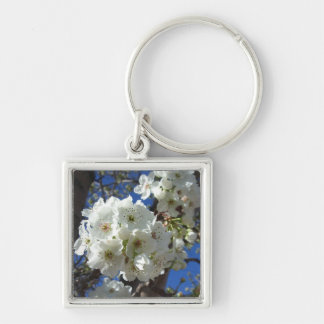 Llavero Flores blancas en el árbol perverso ornamental