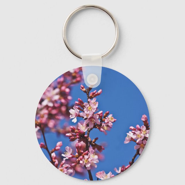 Llavero Flores de Cerezo Sakura Tocando Azul (Anverso)